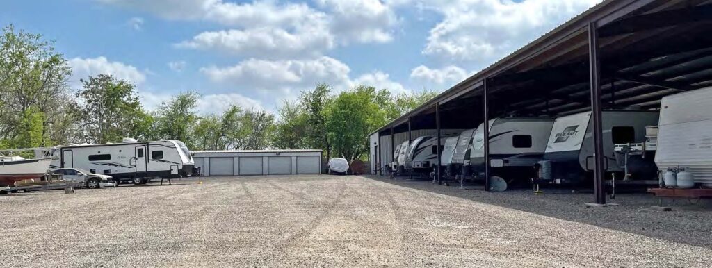 Main building with drive-up storage units and covered vehicle parking